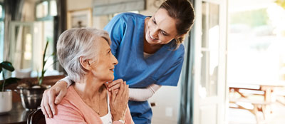 An elderly lady in a care home